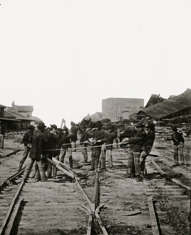Atlanta, Georgia. Sherman's men tearing up railroad track 1864