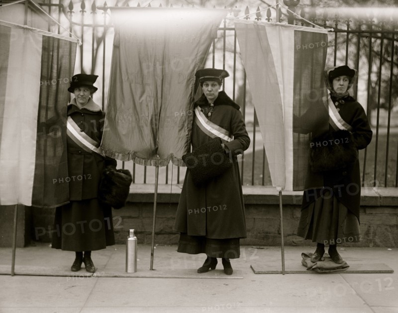 Banners in font of the White House Gates 1913