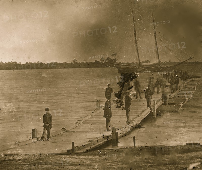 Beaufort, South Carolina. Erecting pontoon bridge across Port Royal River 1862