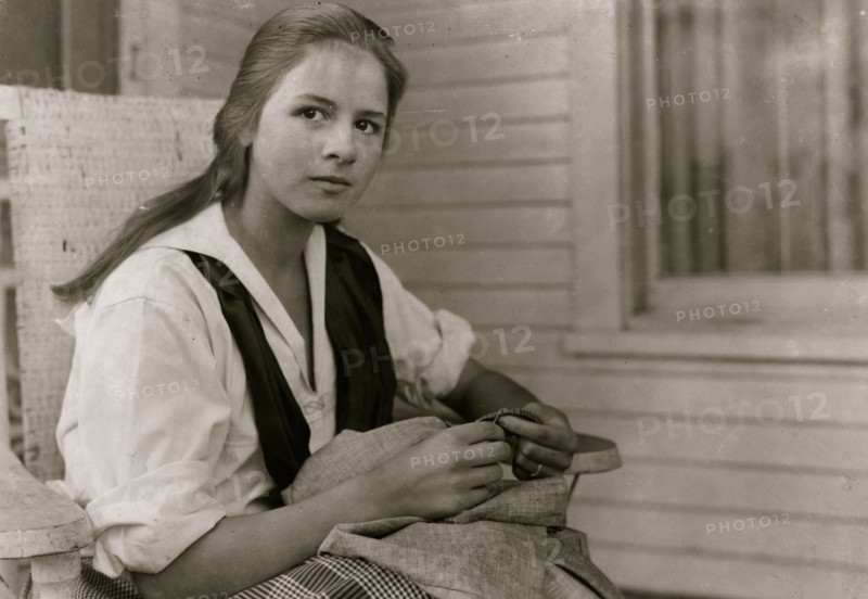 Betsey Price, First year high school at her Club sewing. 4 H Club work, Marlinton, W. Va. Location 1921