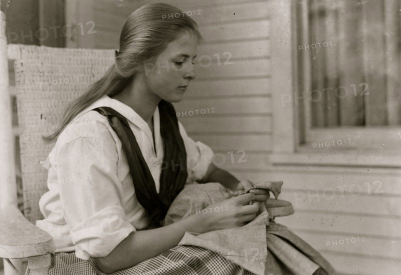 Betsey Price, First year high school at her Club sewing. 4 H Club work, Marlinton, W. Va. Location 1921