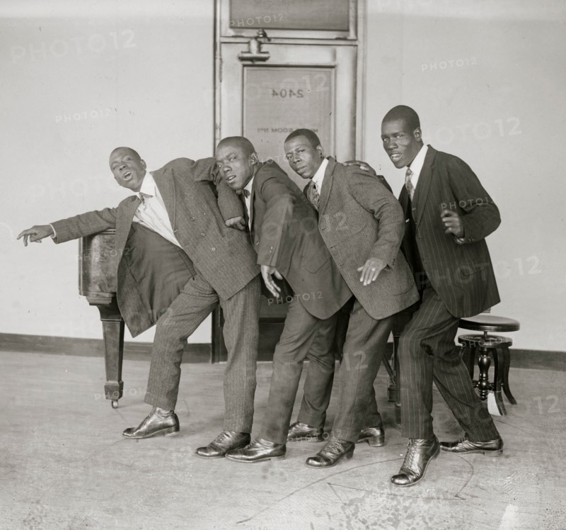 Black singing and dancing group