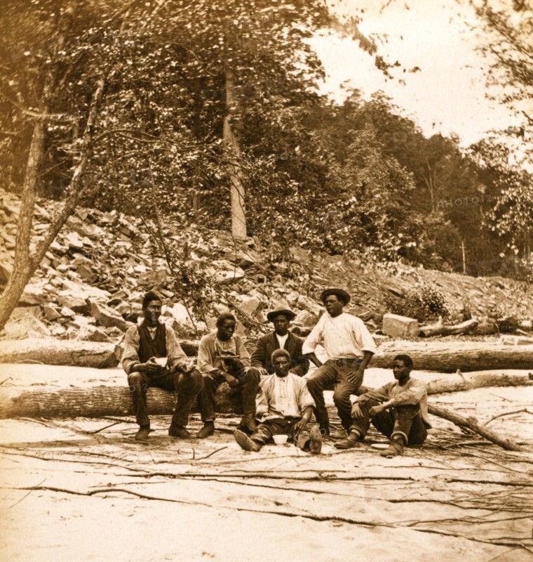 Capt. Ed. Armstrong (Colored) & crew of bateau Tam O'Shanter on beach of New River, 1872