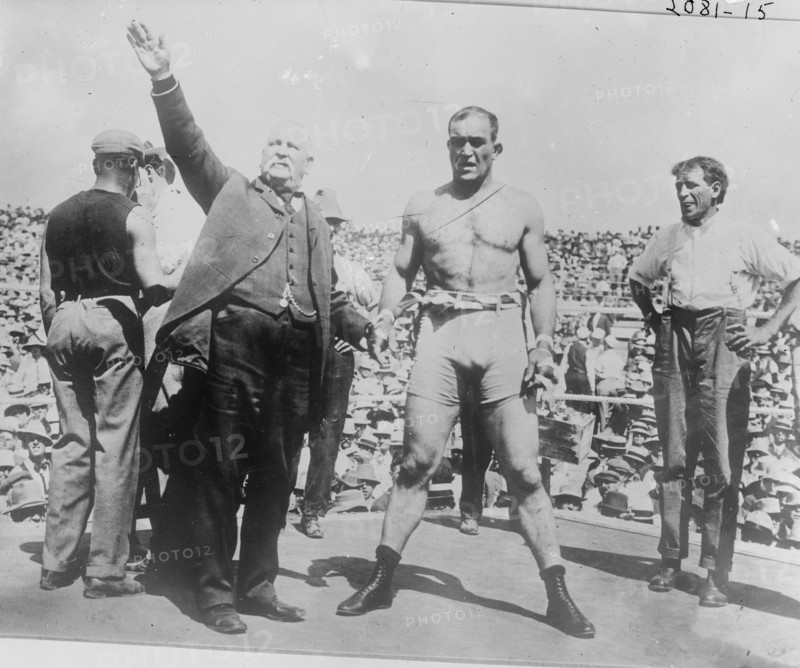 Boxer and announcer in boxing ring