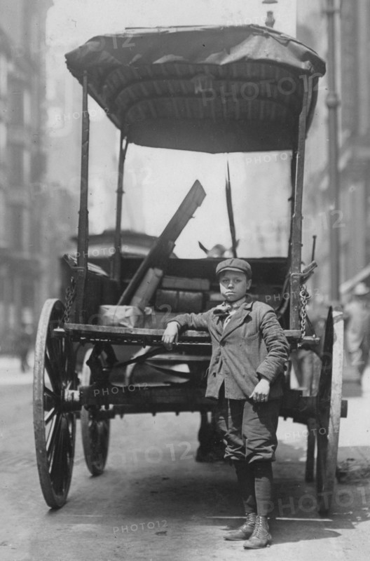 Boys working as assistants on express wagons 1910