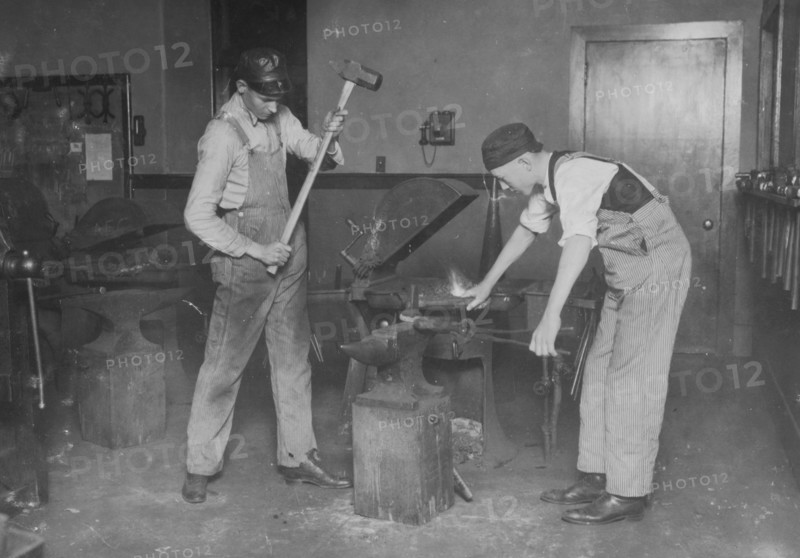 Boys working at forging. Oklahoma City High School 1917