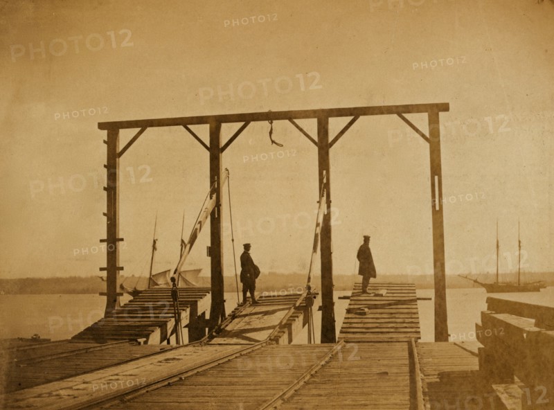 Bridges by means of which cars are loaded upon or unloaded from arks or barges 1863