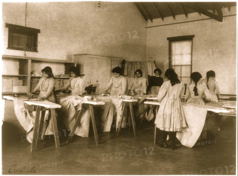 Carlisle Indian School, Carlisle, Pa. Ironing class 1901