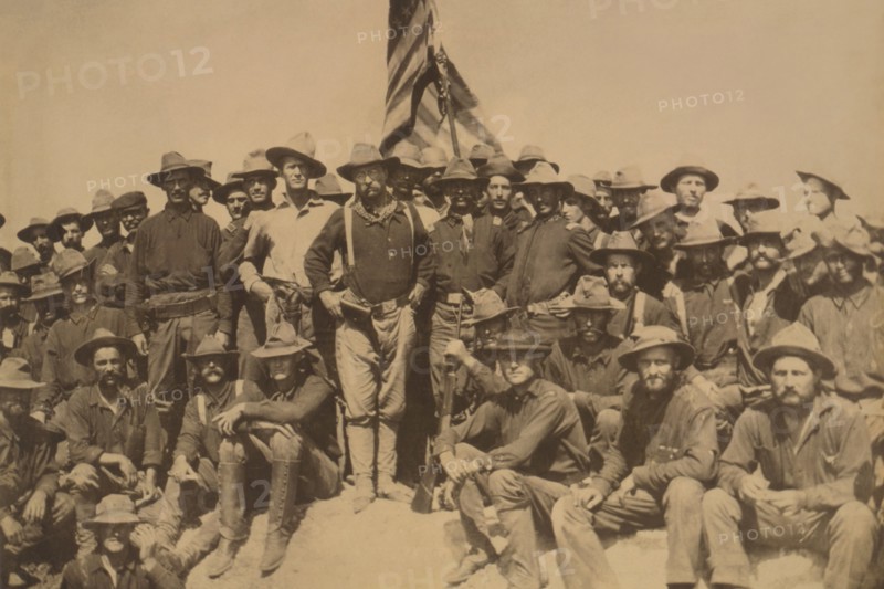 Colonel Roosevelt and his Rough Riders at the top of the hill which they captured, Battle of San Juan 1898
