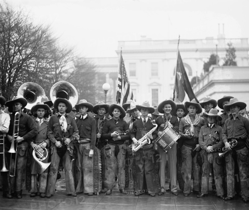 Cowboys at the White House en masse on horses 1923