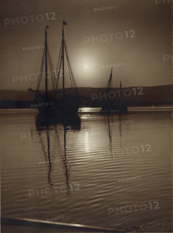 Dead Sea Sunrise over Mt. Nebo breaks upon Sailing ships with unfurled linen 1920