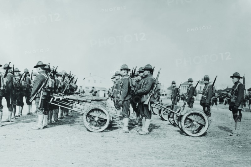 Detachment of a weapons Platoon of a Marine Machine Gun unit parades 1917