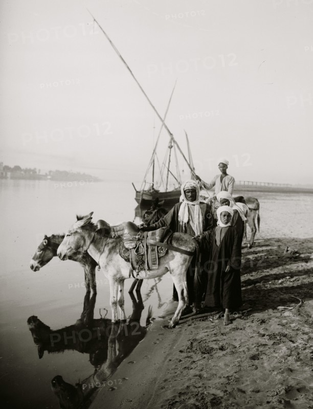 Donkey boys on the banks of the Nile, near Thebes 1910