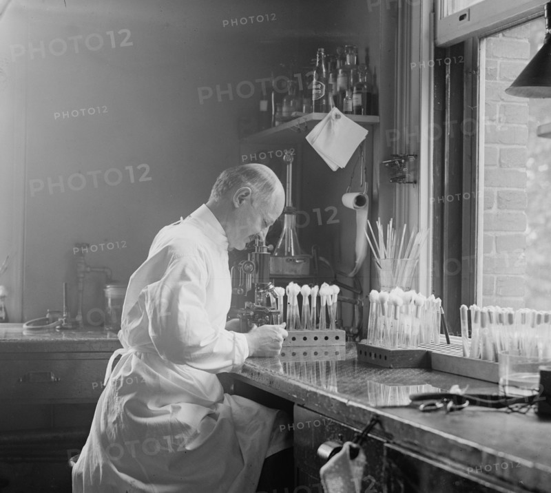Dr. Edward Francis, bacteriologist in his laboratory 1923