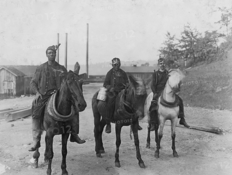 Going home, riding their horses after a day at the mine 1908