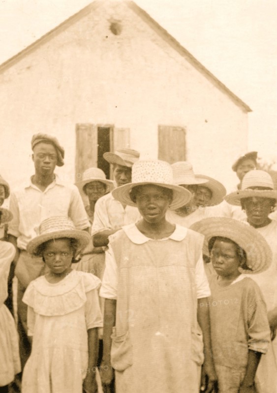 Eliz Austin and children with Cleveland Simmons, Old Bight, Cat Island 1935
