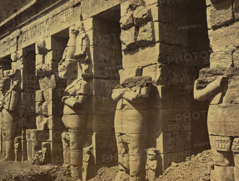 Five statues at the ends of square columns at the Grand Temple in Thebes 1880