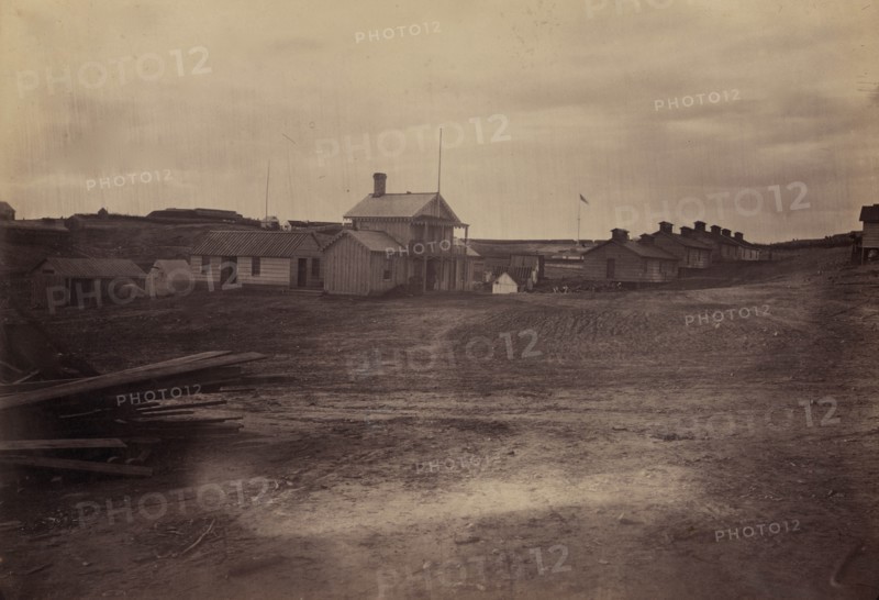 Fort Sumner, barracks for officers and soldiers in foreground 1863