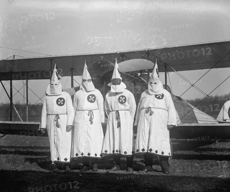 Four Hooded White Sheeted Ku Klux Klan Member pose in Robes & Hoods in front of Airplane 1922