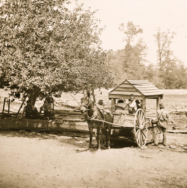 Fredericksburg, Virginia. Soldiers filling water cart. Army of the Potomac 1864