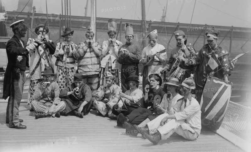 Celtic Firefighters in Dress up band as Clowns with Musical Instruments