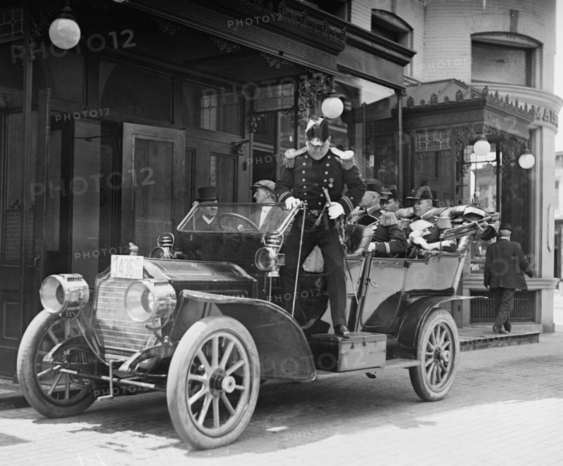 German Military attaché alights from his coupe with others of the German Delegation in DC 1912