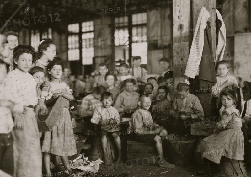 Groups showing a few of the workers stringing beans in the J. S. Farrand Packing Co., Baltimore, Md.  1910