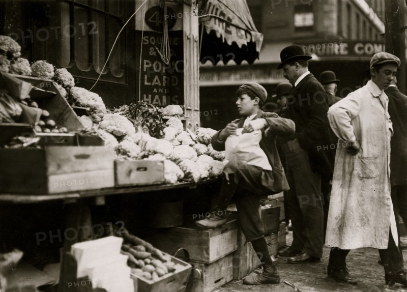 In business for himself selling fruits & vegetables 1909