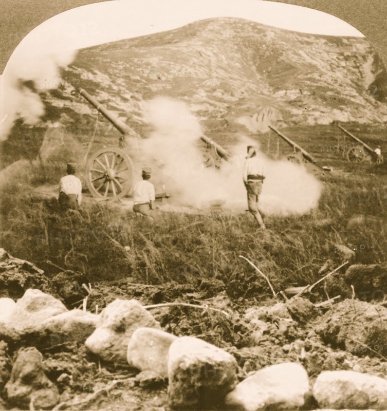 Japanese field battery firing shells over the mountains into doomed Port Arthur 1905