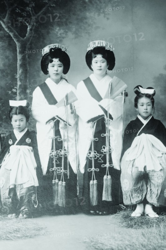 Japanese Mothers with Their Children wear traditional Kimono with Obi & hair combs