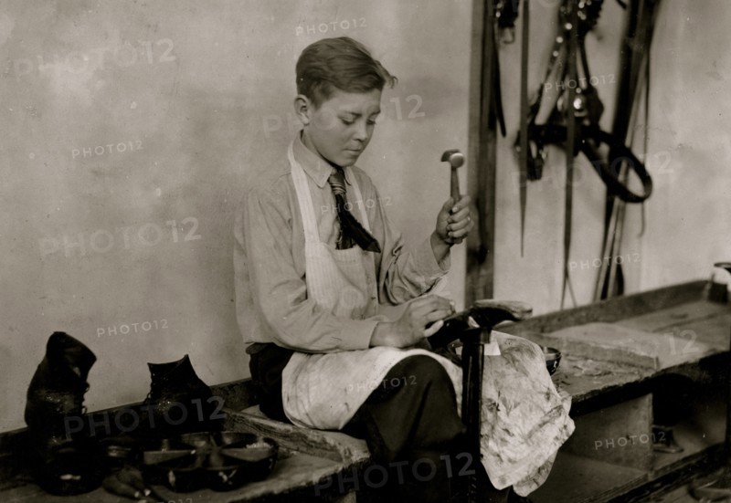 Learning to make shoes. Training School for Deaf Mutes 1917