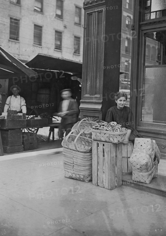 Lena Lochiavo, 11 years old, 209 W. Sixth St., Basket Seller, Sixth Street Market,  1908