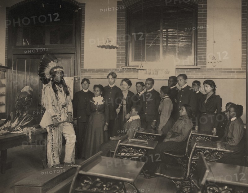Louis Firetail wearing tribal clothingat Hampton Institute, Hampton, Virginia 1900