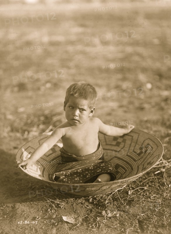 Toddler in Basket 1907