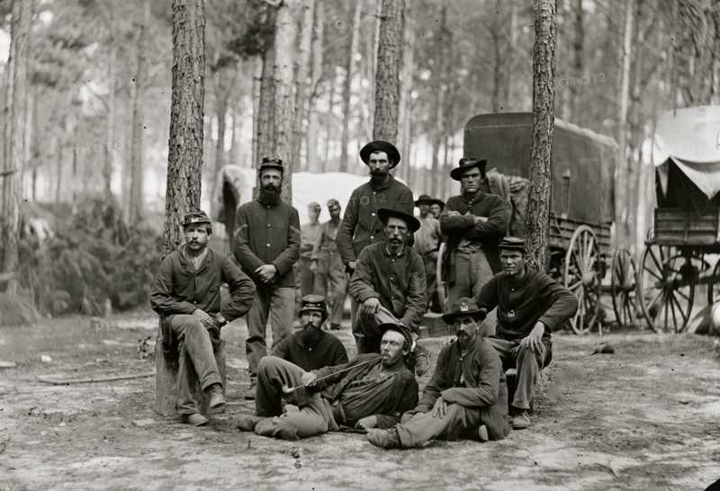 Petersburg, Va. Group of Company B, U.S. Engineer Battalion; wagons in background 1863