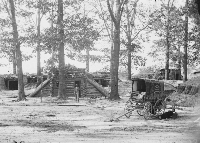 Petersburg, Virginia. Bomb-proofs in front of Petersburg. (Photographic wagon, Engineer Department shown 1865