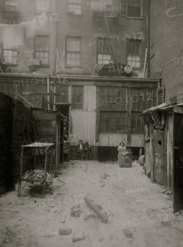 Rear view of tenement, 134 1/2 Thompson Street, New York City. See Photos of flower makers working here 1912