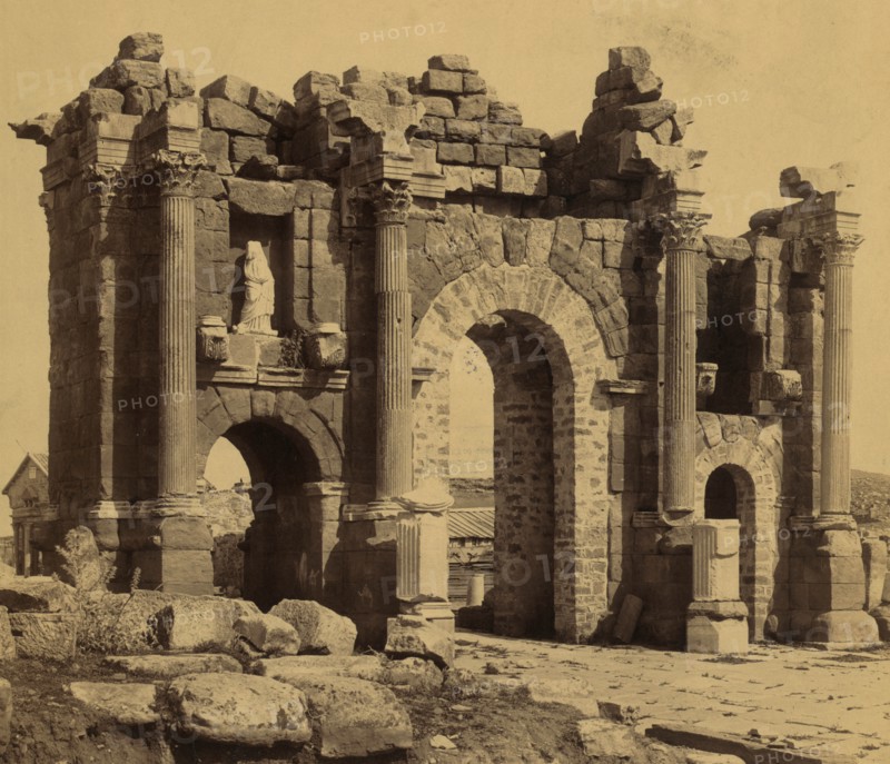 Remains of Roman Arch of Trajan at Thamugadi (Timgad), Algeria. 1875
