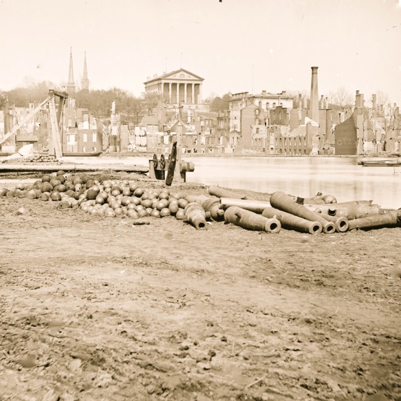 Richmond, Va. View of the burned district and the Capitol across the Canal Basin 1865