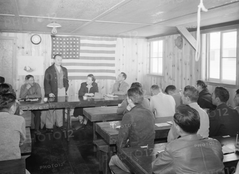 Roy Takano [i.e., Takeno] at town hall meeting, Manzanar Relocation Center, California 1943