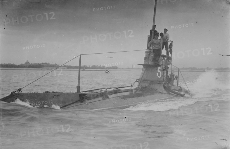 Royal Navy British Submarine A5  on Coast with Navy Men on Conning Tower above surface 1915