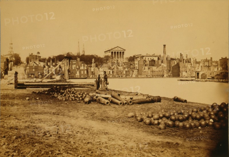 View taken from south side of canal basin, Richmond, Va., - April, 1865--showing Capitol, Custom House, etc. 1863