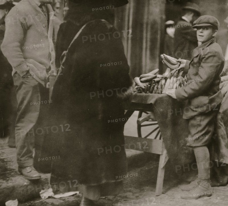 Selling bananas at market.  1917