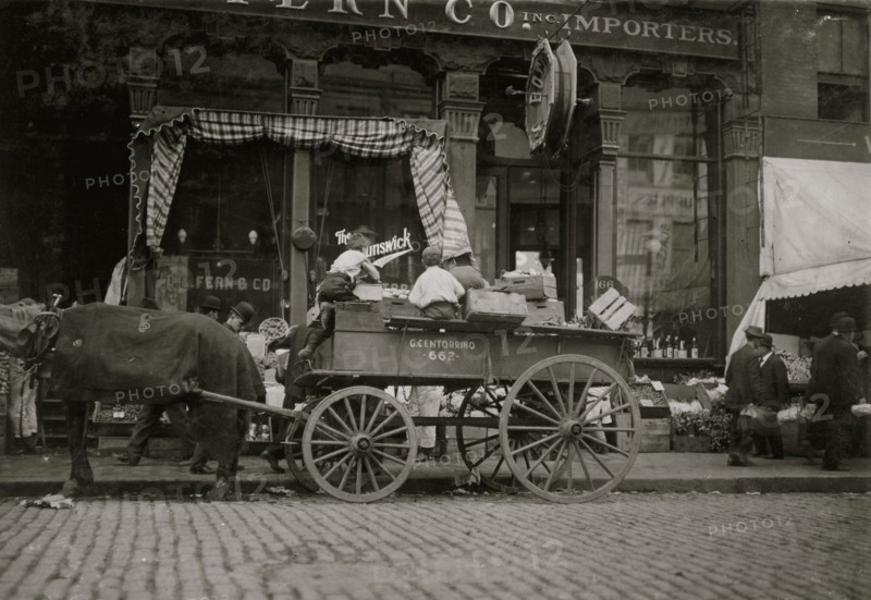 Starting in Business Early. Selling Vegetables in the Market. 1909