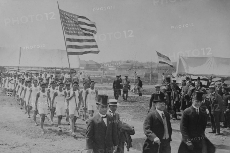 American & Filipino Athletes March Behind Japanese Dignitaries