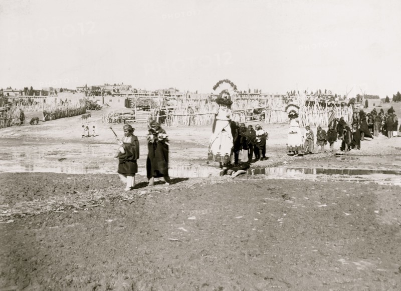 The Shalaco dancers crossing to south side of the river to dance on the plain 1898