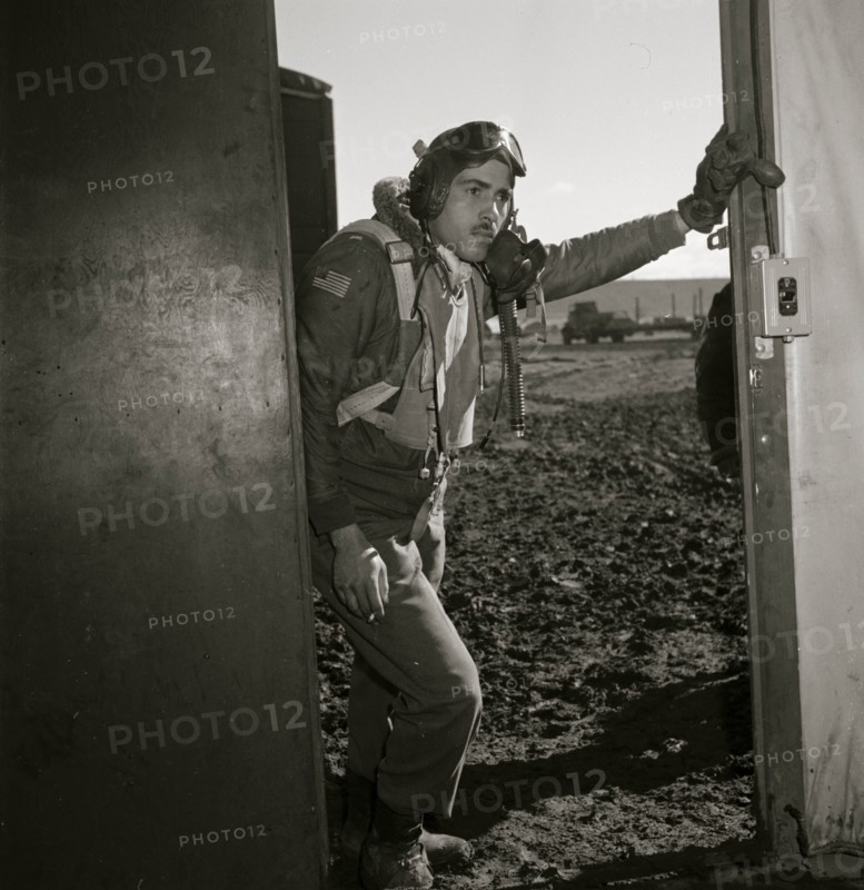 Portrait of Tuskegee airman Edward M. Thomas, standing 1945