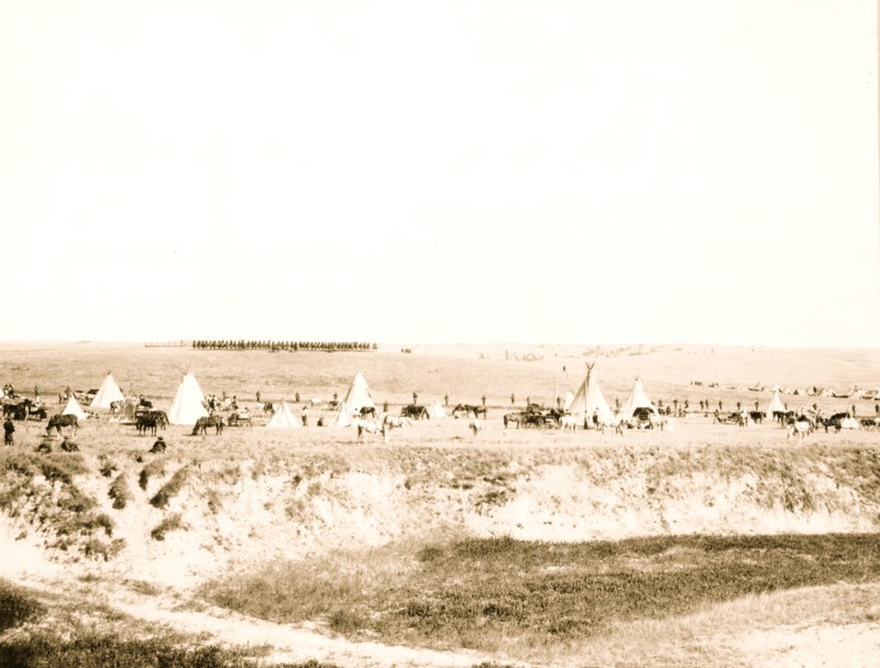 U.S. troops surrounding the Indians on Wounded Knee battle field 1913