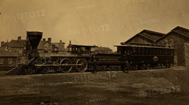 Engine W. H. Whiton, and President's car, Alexandria, January,1865 1865