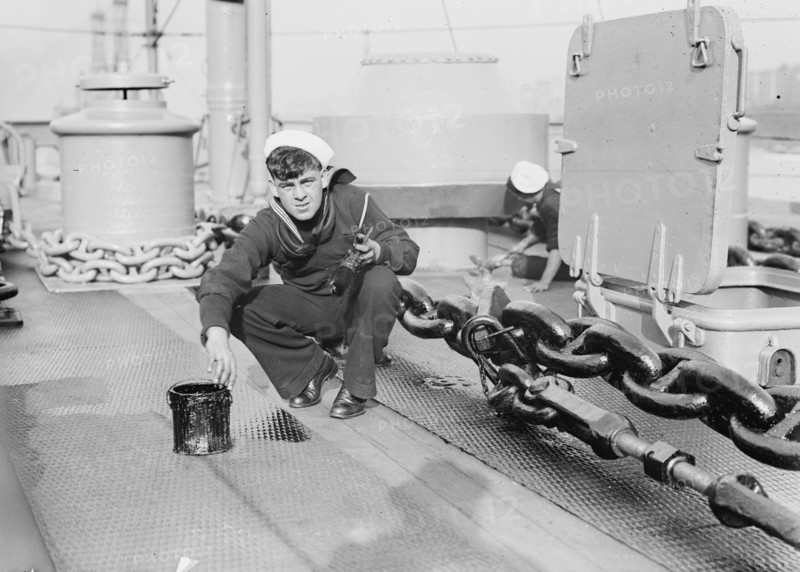 US Sailor paints the deck of the Battleship Connecticut 1912